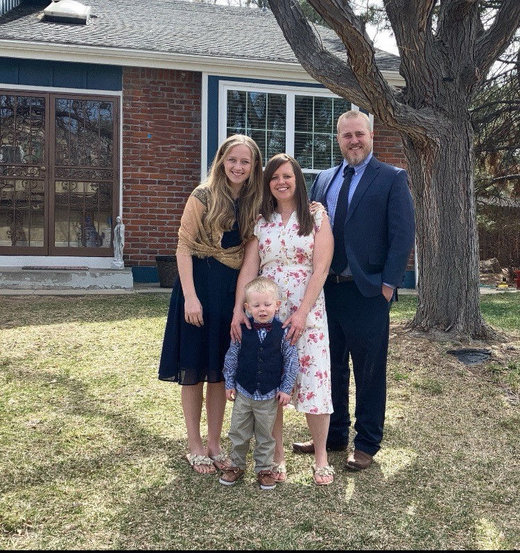 Mike and Ashley Demmon pose with their daughter and son